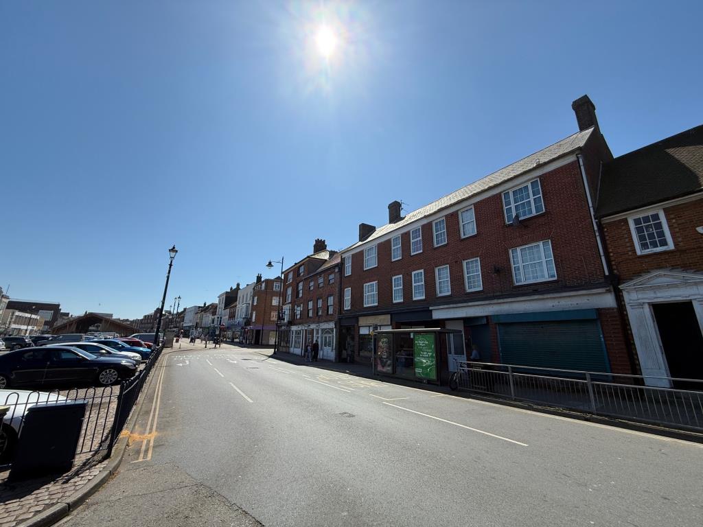 Lot: 87 - MIXED USE COMMERCIAL/RESIDENTIAL BUILDING IN THE TOWN CENTRE - Street view of the property in Gt Yarmouth town centre